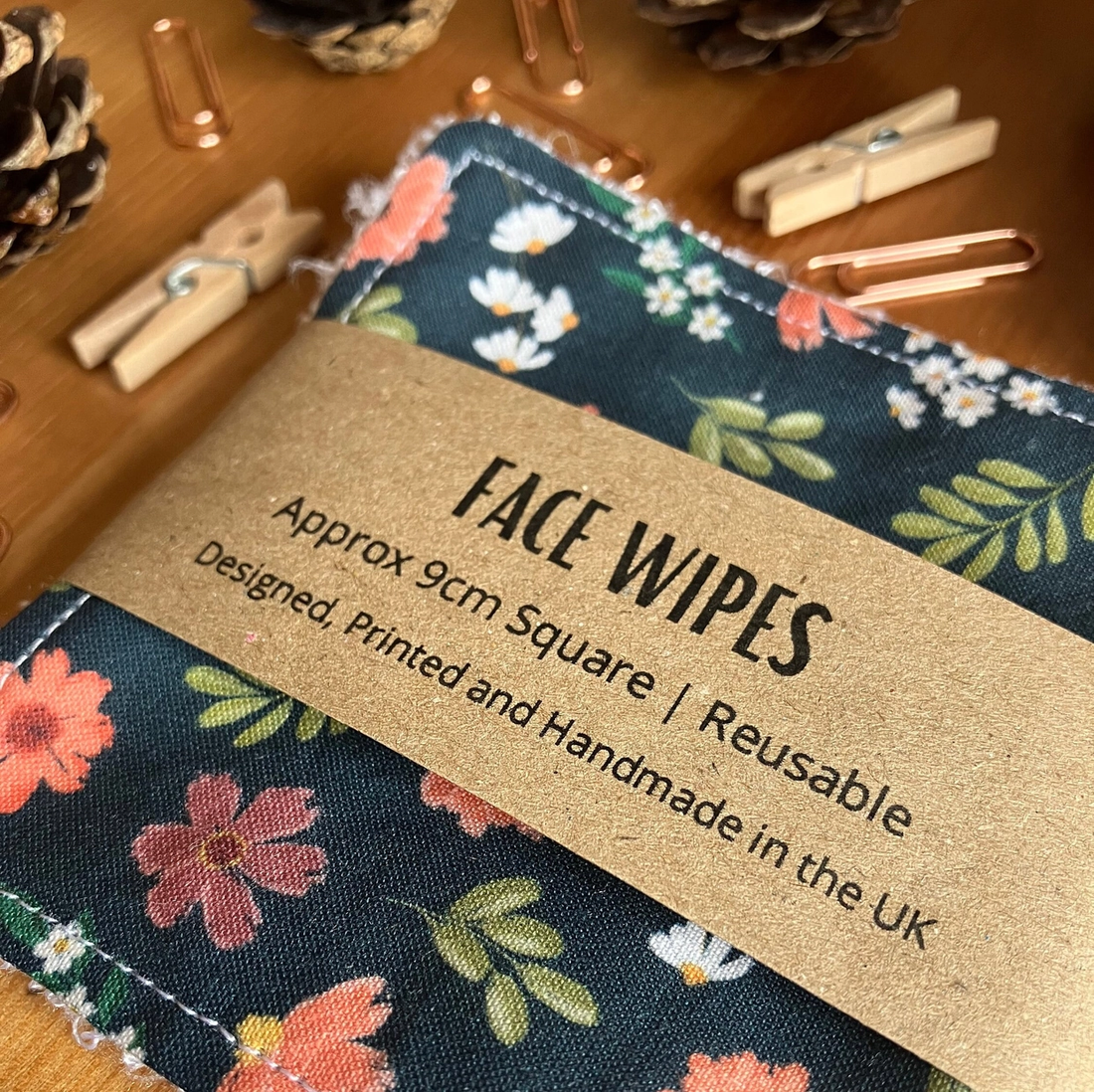 A pack of 4 reusable face wipes by SH Designs