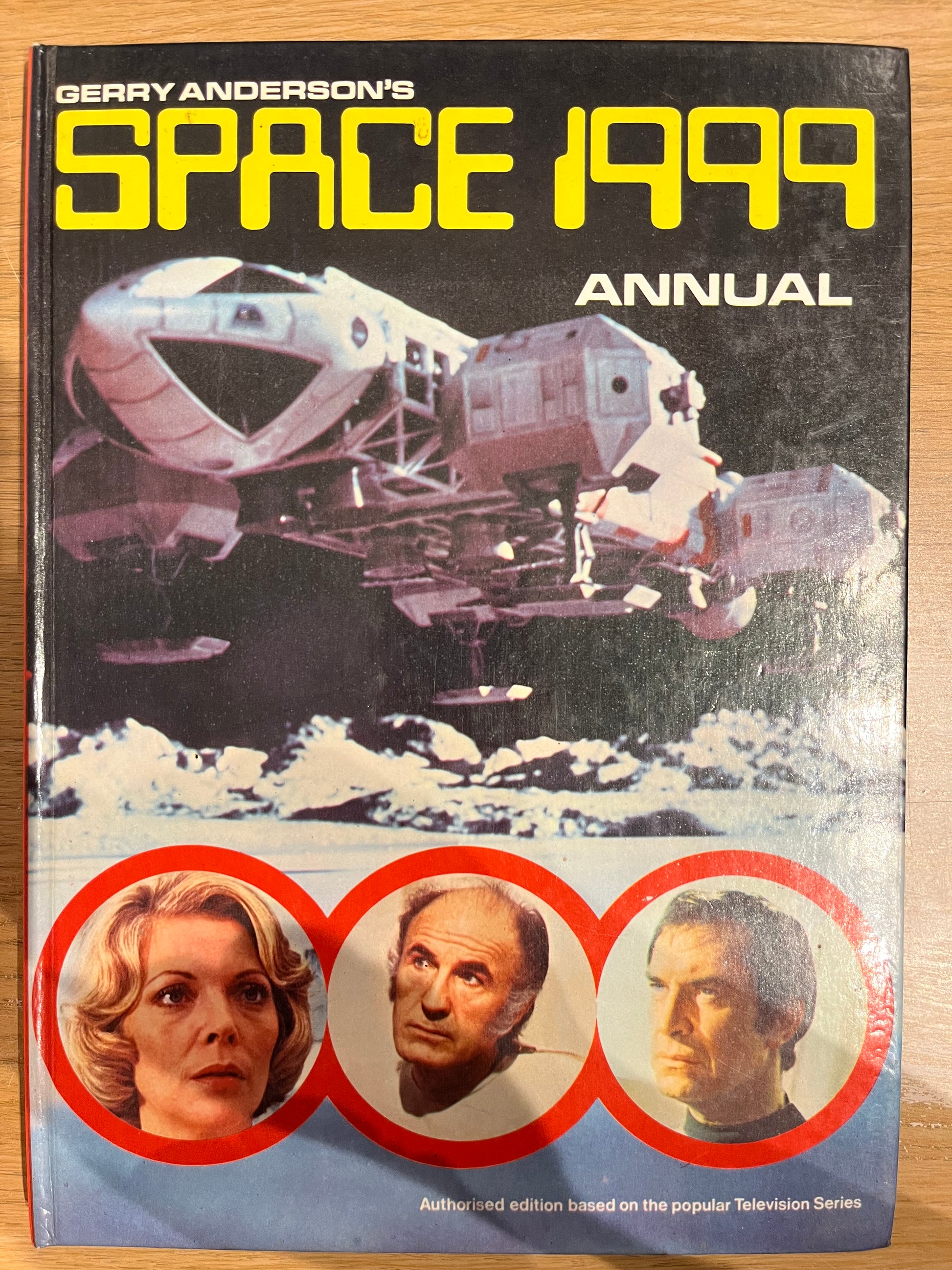 Space Annual 1999 book cover with space-themed design and images of people.