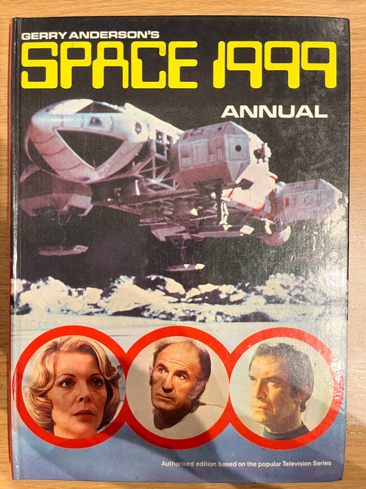 Space Annual 1999 book cover with space-themed design and images of people.