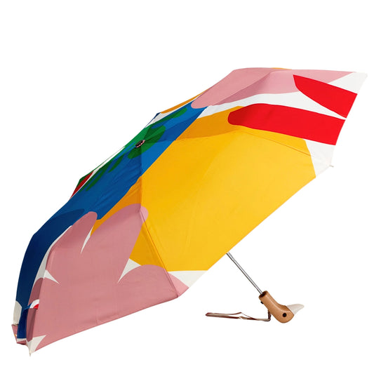 Matisse compact umbrella by Original Duckhead open showing bold Matisse cut-out design in primary colours on white rPET canopy, 56cm
